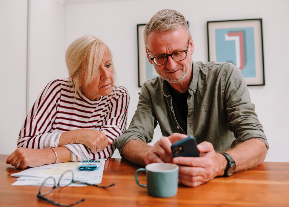 Couple looking at phone