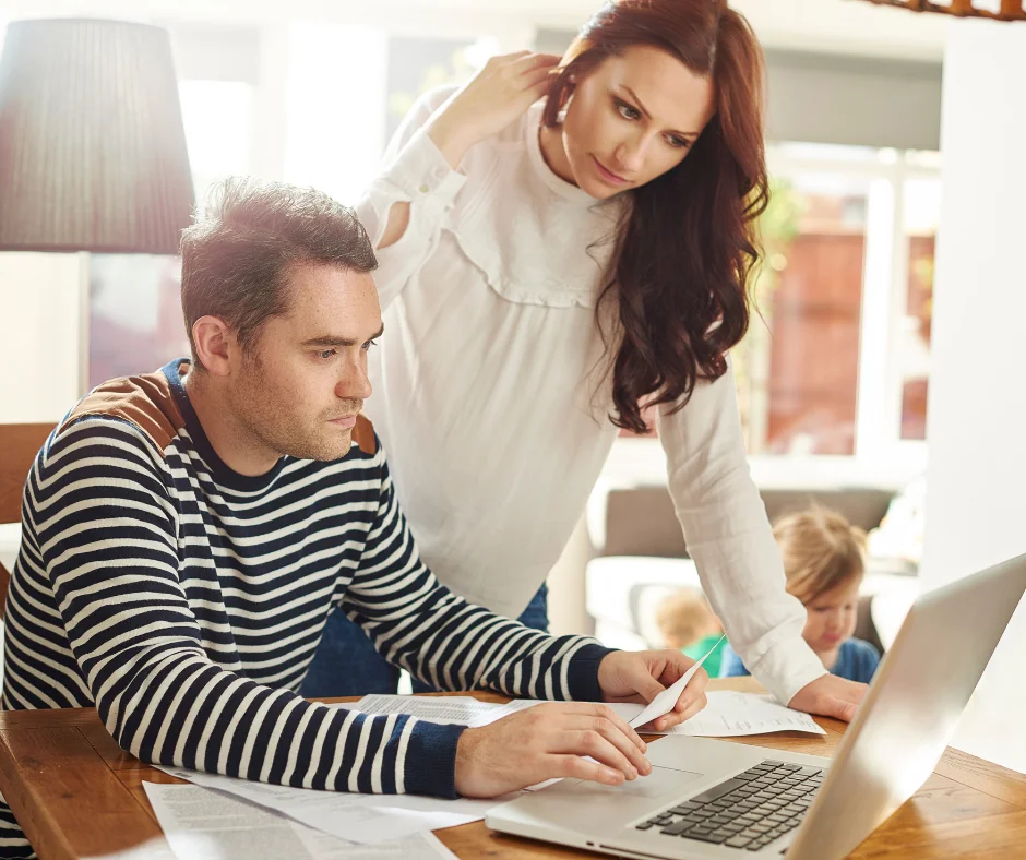 Couple looking computer